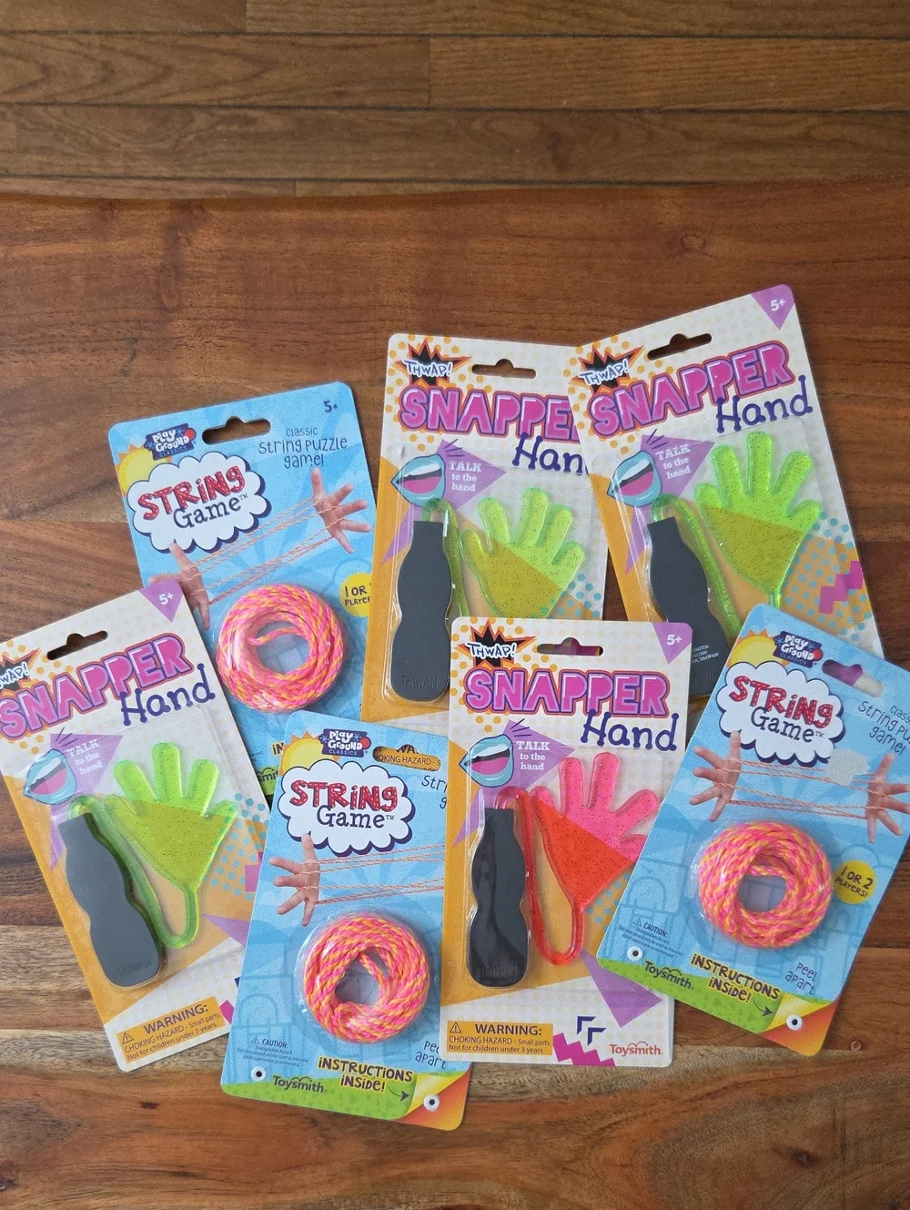 Party Favors - Set Of 7 Featuring Snapper Hand And String Game